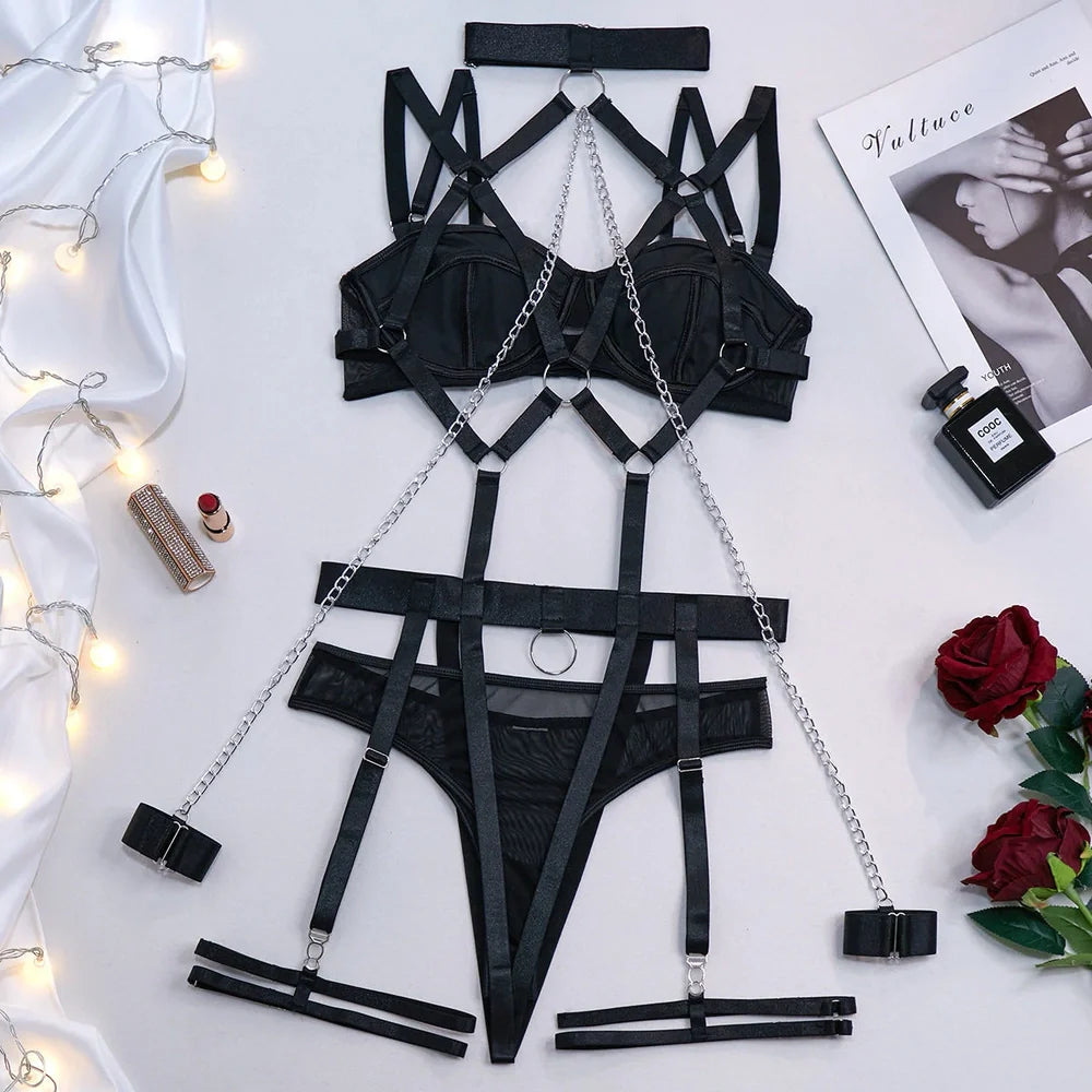 Women's black lingerie chain set with top, T-pants, two bracelets, and garter showing biker suit design