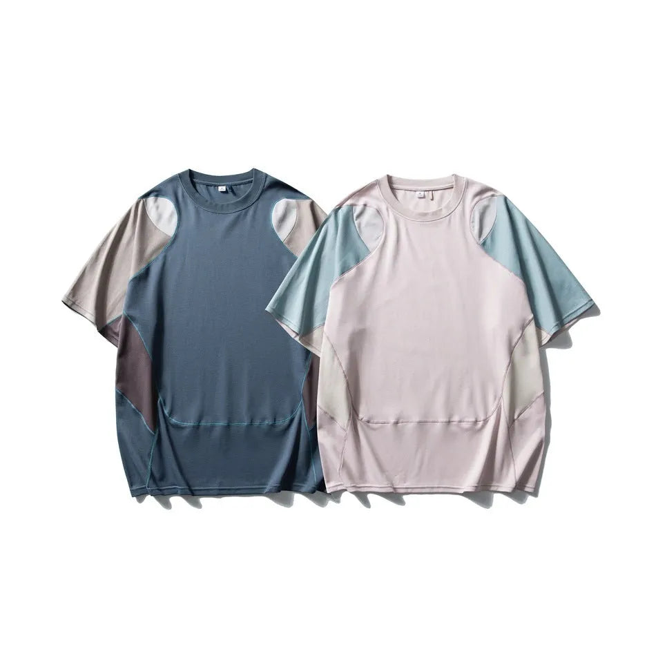 Men's loose blue cotton blend sports T-shirt with short raglan sleeves on a hanger.