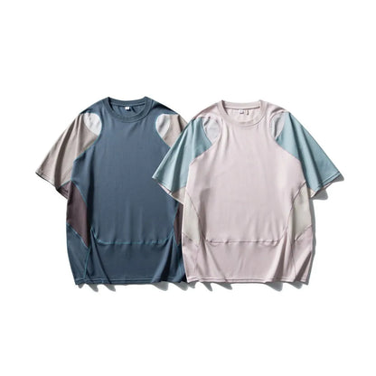Men's loose blue cotton blend sports T-shirt with short raglan sleeves on a hanger.