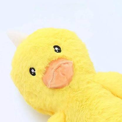 Large pink and yellow plush dog toy with rattle and crinkle paper sounds for golden retrievers