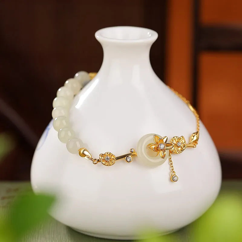 Hetian jade lotus peace buckle bracelet in 925 silver with gold plating, antique retro style