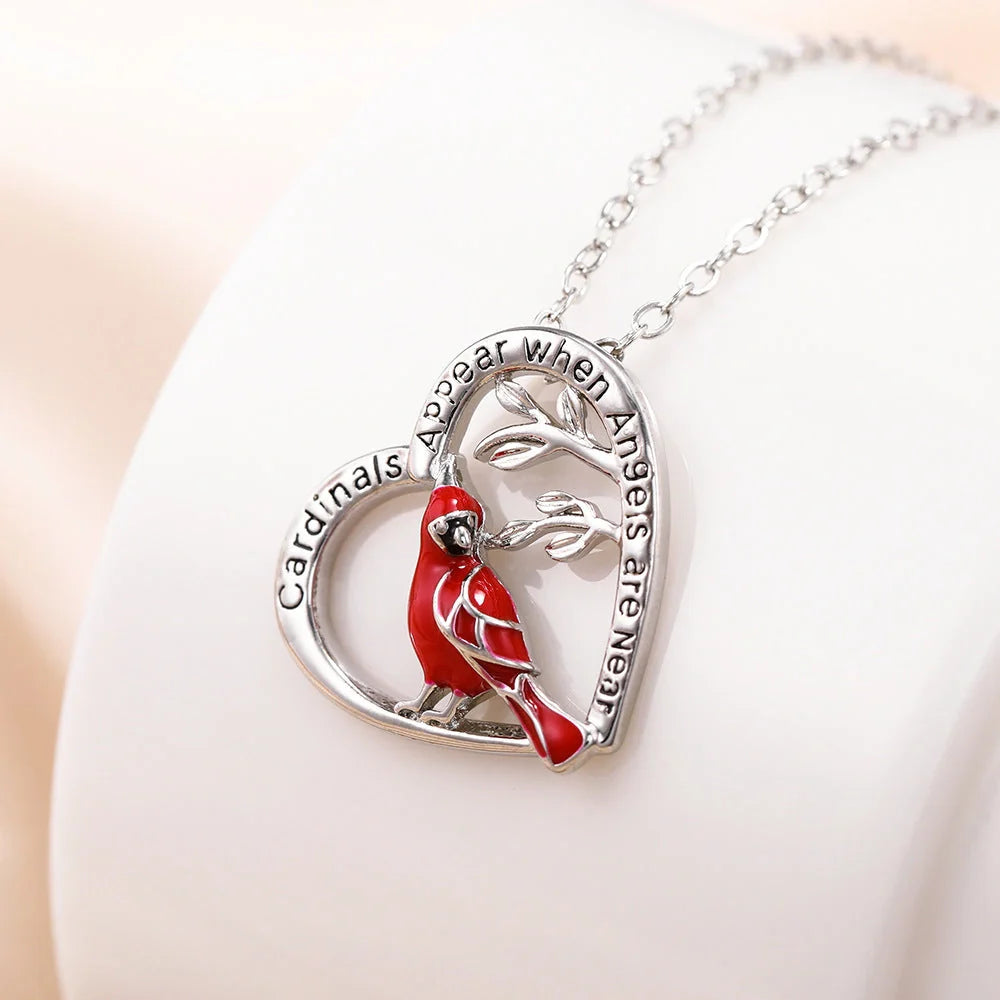 Elegant heart-shaped cardinal pendant necklace perfect for anniversaries and Valentine's Day gifts.