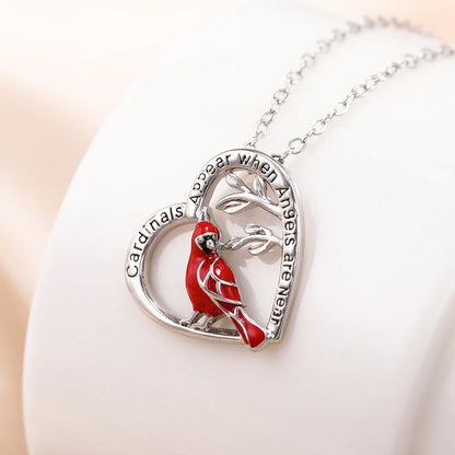 Elegant heart-shaped cardinal pendant necklace perfect for anniversaries and Valentine's Day gifts.