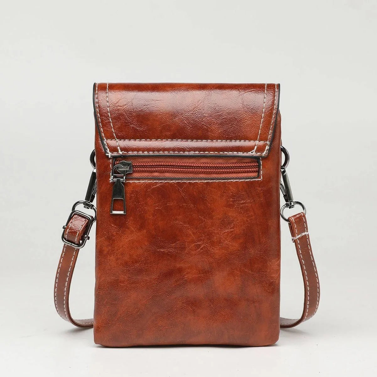 Stylish crossbody bag with mobile phone pocket, available in yellow, black, and brown colors