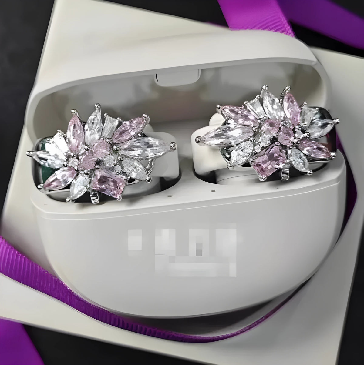 Zircon earphone clip in silver plate with electroplated finish, shown in pink, purple or gold with heart or geometric shape.