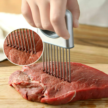 Stainless steel onion holder slicer tool with sharp prongs and a finger guard protector on a kitchen surface.