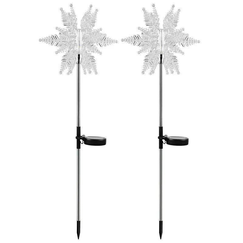 LED solar snowflake garden light with flower-shaped head, warm light, and 2V 100mA solar panel for outdoor lawn use