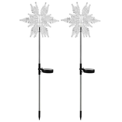LED solar snowflake garden light with flower-shaped head, warm light, and 2V 100mA solar panel for outdoor lawn use