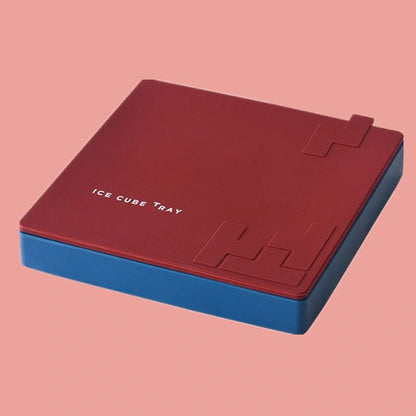 Labyrinth silicone ice cube tray in yellow, blue, and red for unique drink presentation