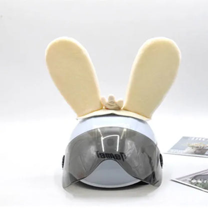 Rabbit ear ski helmet ornament with LED lighting and Velcro base attachment for helmet customisation