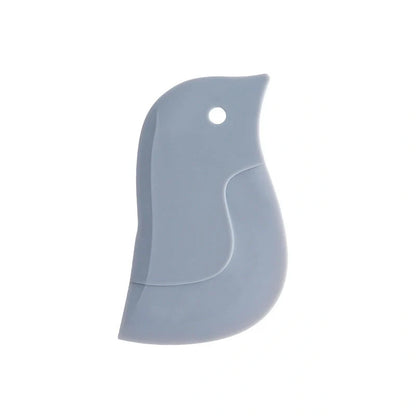 Cute penguin-shaped kitchen scraper for easy cleaning of plates and pots
