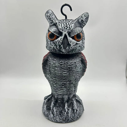 Set of artificial owl bait ornaments with shaking heads for scaring birds outdoors.