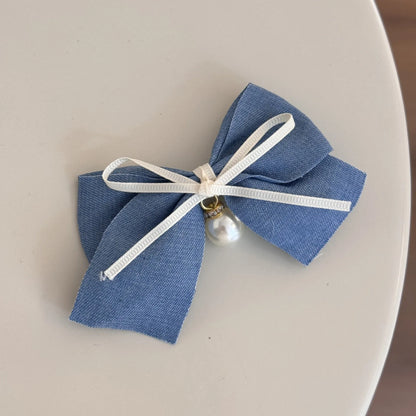 Cloth barrette hairpin set showing blue bow, beige lace, and pearl butterfly designs