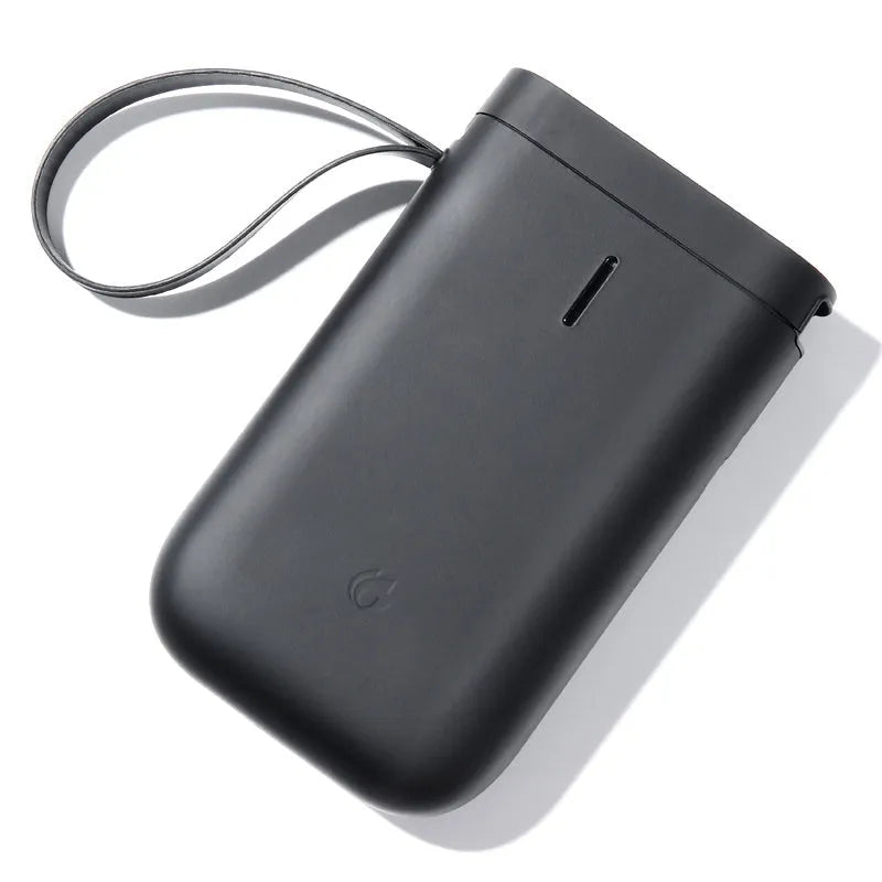 D11 Bluetooth thermal label printer in black, showing compact design and smartphone app connection
