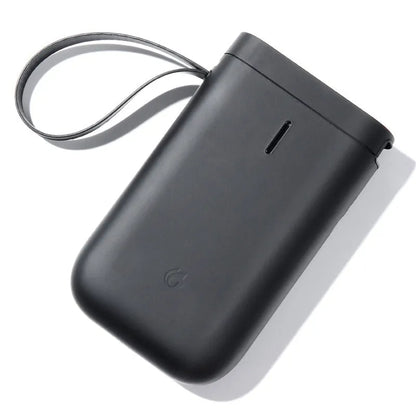 D11 Bluetooth thermal label printer in black, showing compact design and smartphone app connection
