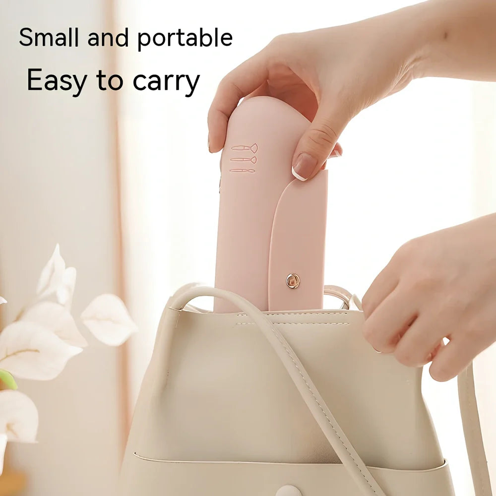 Pink silicone buggy bag for travel makeup, handbag shape, 20cm long, organises cosmetics for business trips