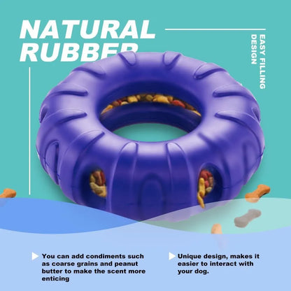 Blue tyre-shaped dog chew toy with oval openings, made from natural rubber for slow feeding