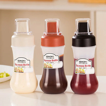 Five-hole Scale Squeezing Sauce Bottle with Lid in elegant black, grey, and Finnish red