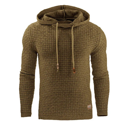 Man wearing a cotton-polyester blend hooded sweatshirt in grey, showing the front design and hood.