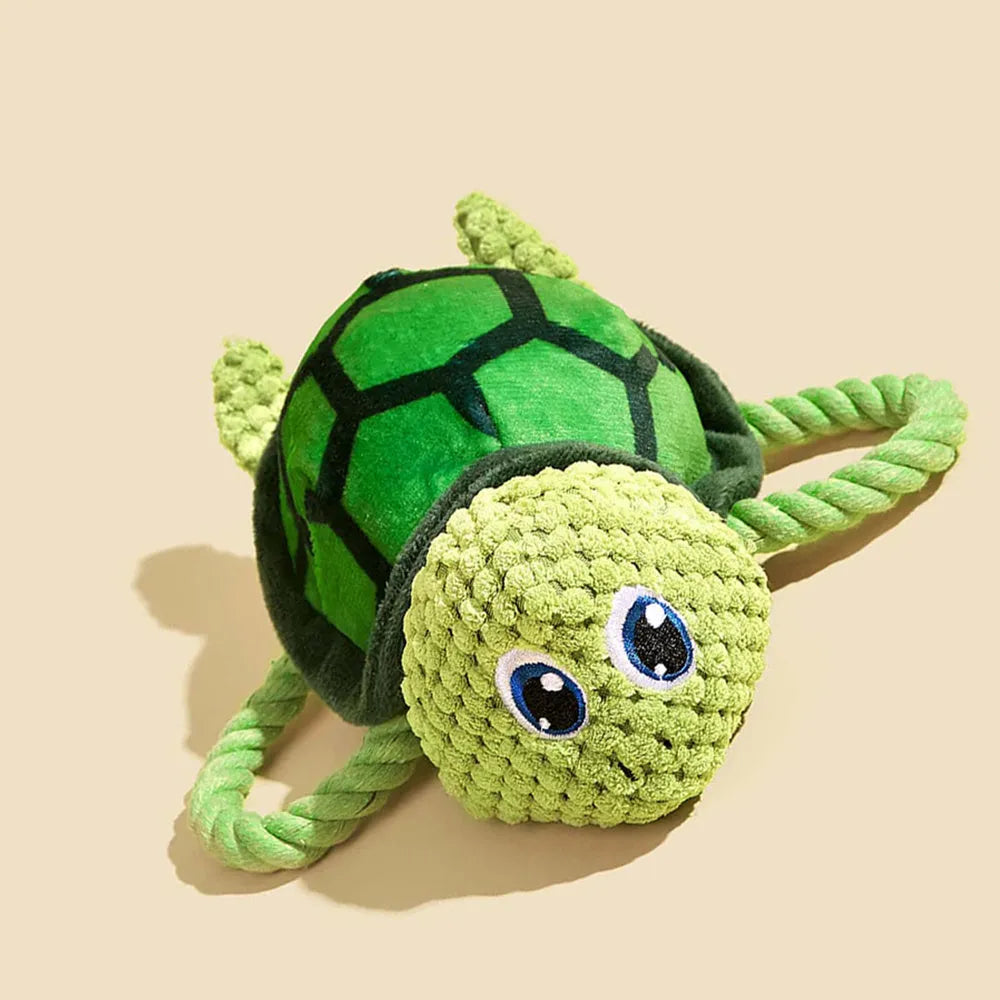 Turtle-shaped plush dog toy with knotted rope core in green colour