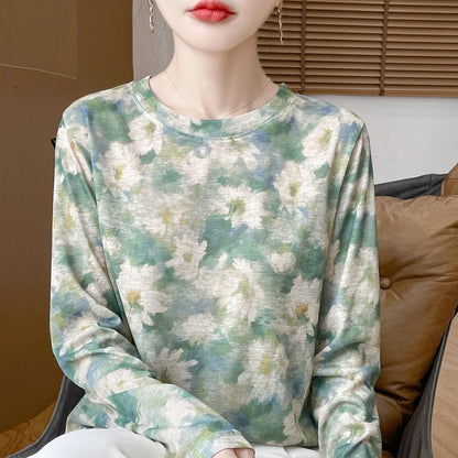 Round neck floral print pullover shirt in Tencel cotton blend fabric on hanger