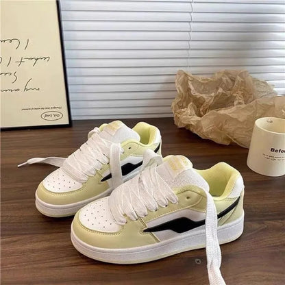 Women's low top board shoes in solid pink, white yellow, white black, or white red with mid heel and rubber sole
