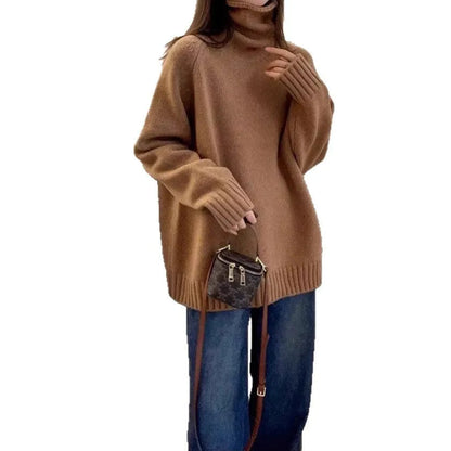 Women's turtleneck sweater in loose fit with thick curling pile collar, available in red, camel, grey, and black colours
