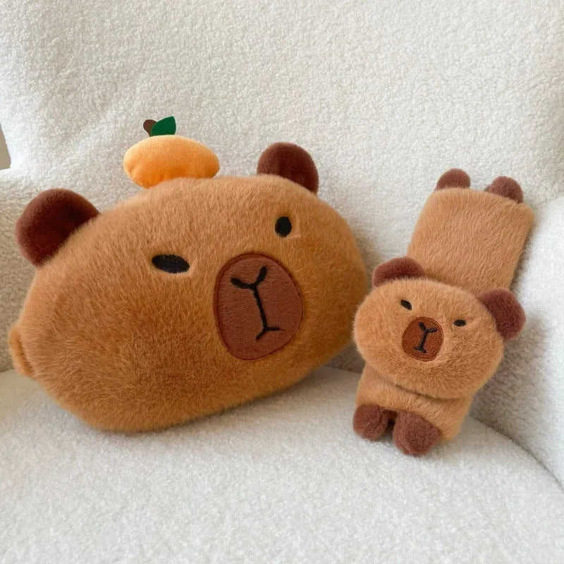 Khaki capybara car pillow in artificial plush with synthetic fibre filling, shown as a car neck pillow or shoulder cover.