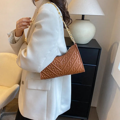 Brown pleated chain baguette shoulder underarm bag with adjustable strap and soft carry handle