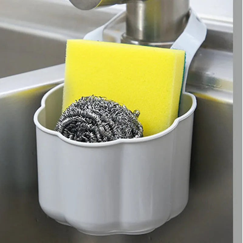 Nordic style plastic sink drain basket with draining compartment in blue, grey, or pink colour options.