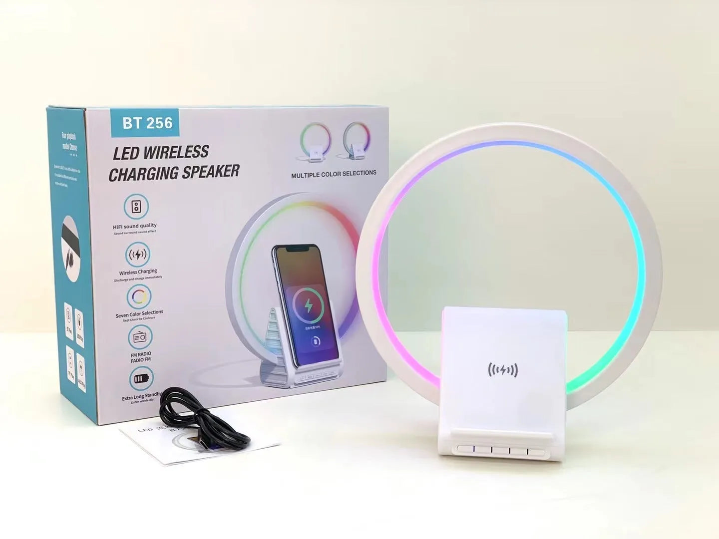 White wireless charging Bluetooth speaker with ambient lighting, compact rectangular design measuring 225mm x 200mm x 10mm