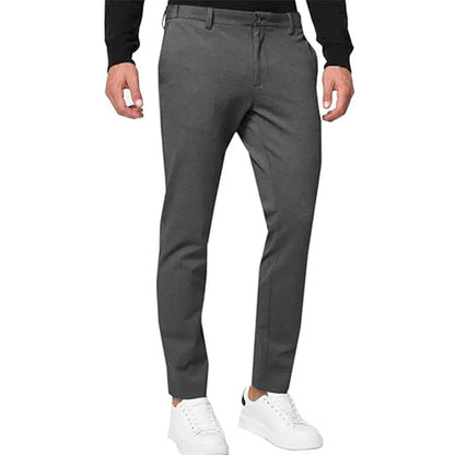 Men's slim-fit tapered chino trousers in a cotton blend fabric, shown in a solid colour.