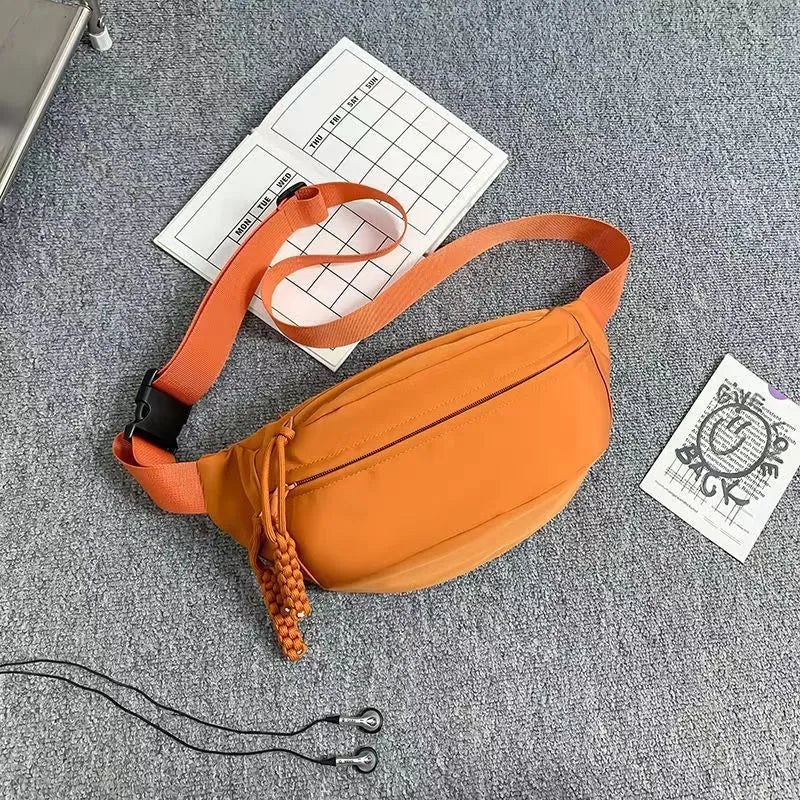 Men's polyester crossbody bag in black colour showing shoulder strap and front compartment