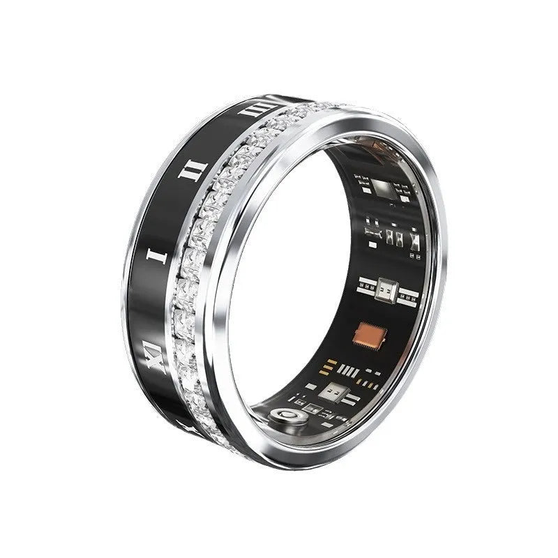 Gold and silver diamond-inlaid smart ring for blood oxygen monitoring on a finger.
