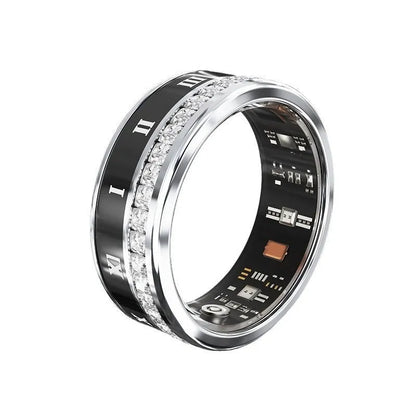Gold and silver diamond-inlaid smart ring for blood oxygen monitoring on a finger.