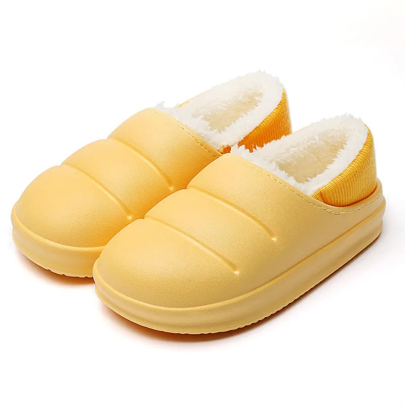 A pair of green waterproof EVA garden slippers with a plush lining and textured non-slip sole.