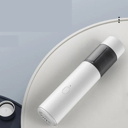 Mini car vacuum cleaner with wireless charging in black and white options