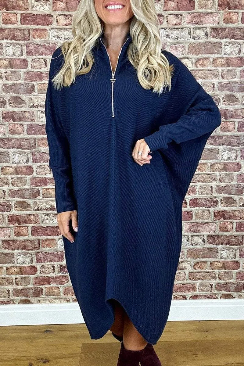 Women's solid colour loose fit knitted dress with raglan sleeves and a front zipper.