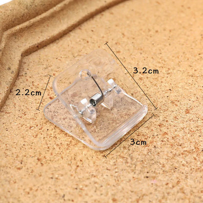 Square plastic photo holder in black, white, and transparent colour options on desk