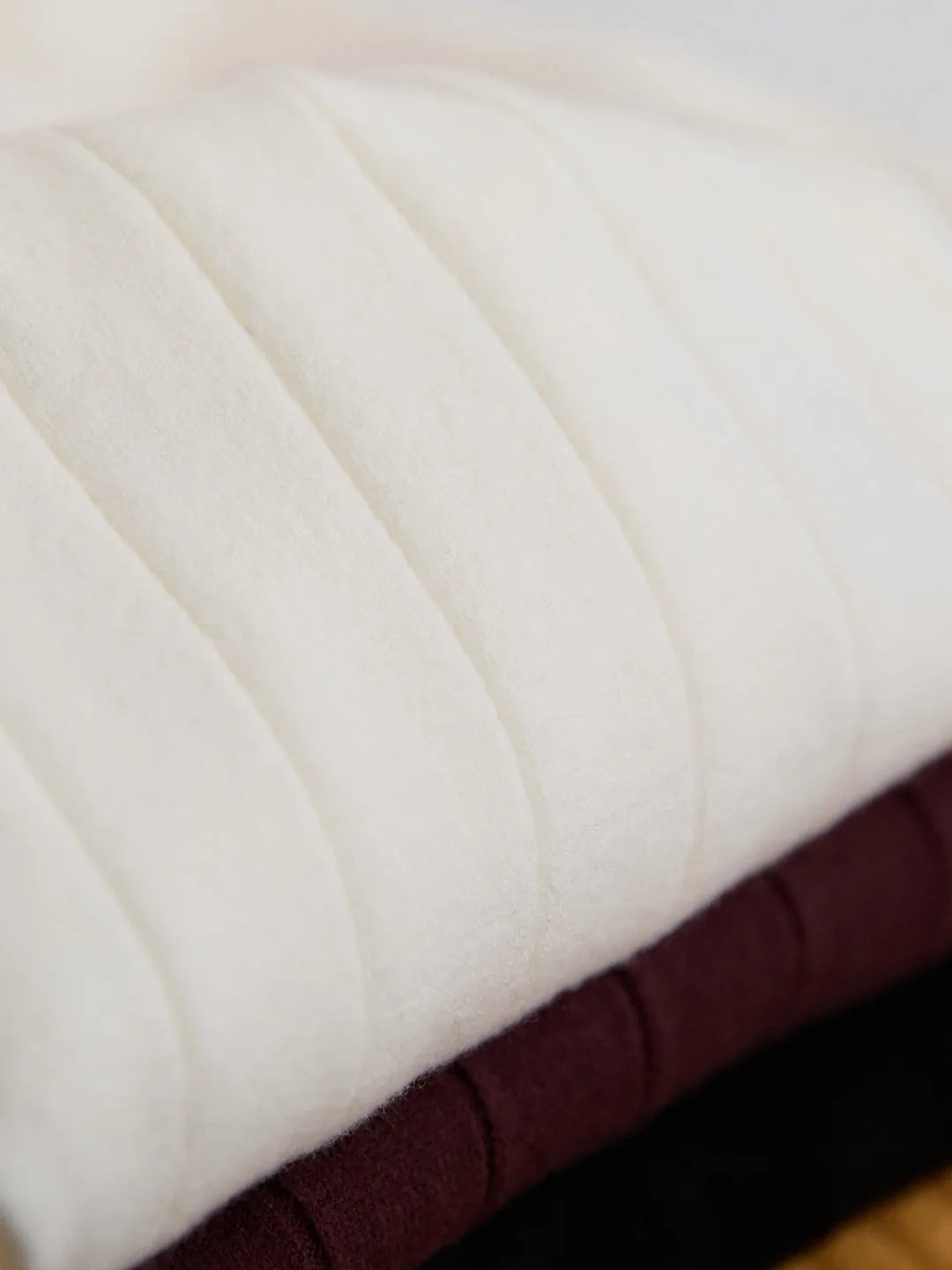 Half turtleneck wool knitted short sleeve T-shirt in black, white or chocolate, sizes M to 2XL, five-fibre blend