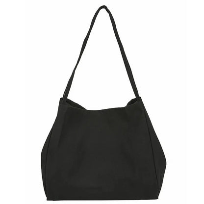 Solid colour women's canvas handbag with double shoulder straps showing internal mobile phone compartment