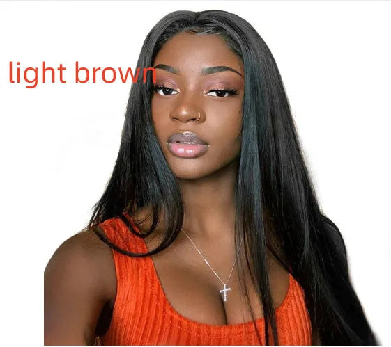 Long black straight synthetic wig on a stand, showing centre parting and full fringe