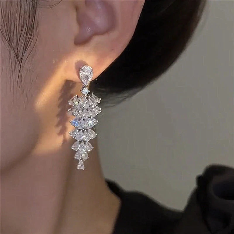 Sparkling crystal Christmas tree earrings with a dazzling design, perfect for holiday parties and events