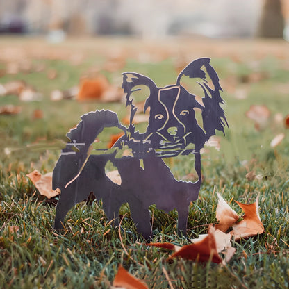 Metal dog silhouette garden decoration showing breed outline on iron background for outdoor display