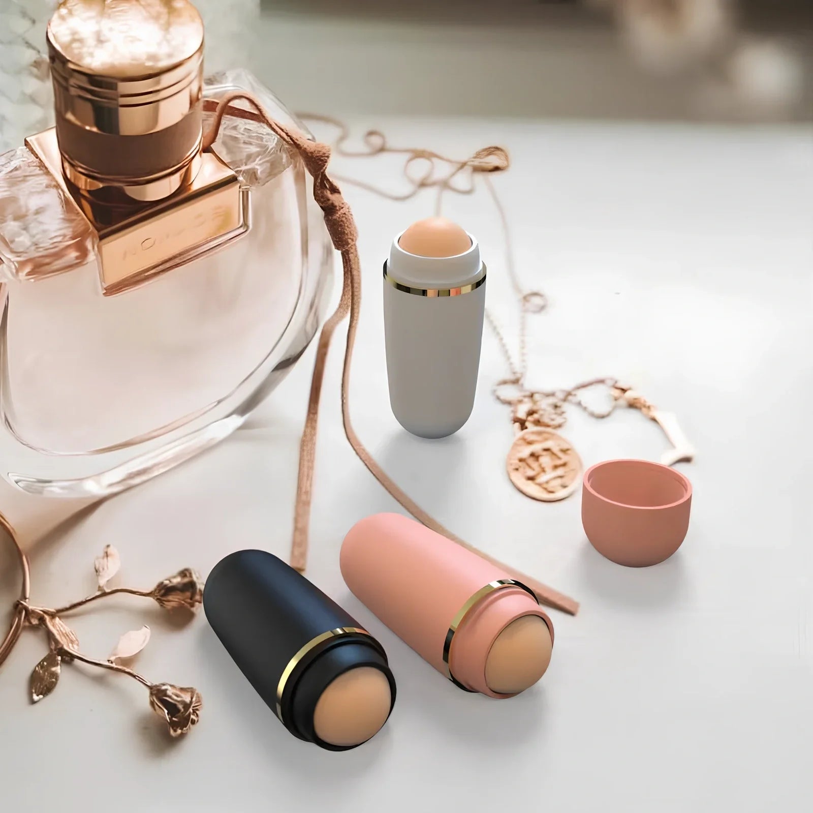 Portable volcanic stone oil absorbing ball measuring 3×8×2cm in white, black, and pink colour options