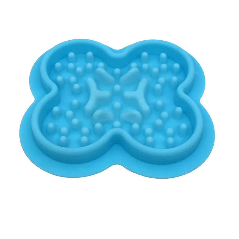 Silicone pet licking mat in green with textured surface and suction cups on base