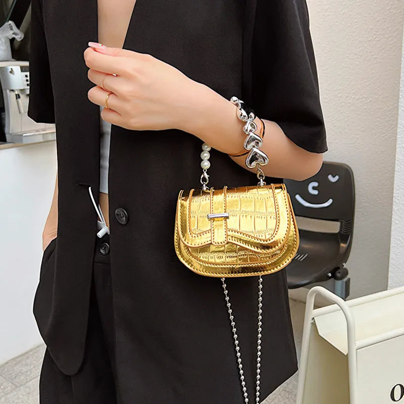Laser Pearl Tote Saddle Girl Mini crossbody bag in black with sandwich pocket design and adjustable strap