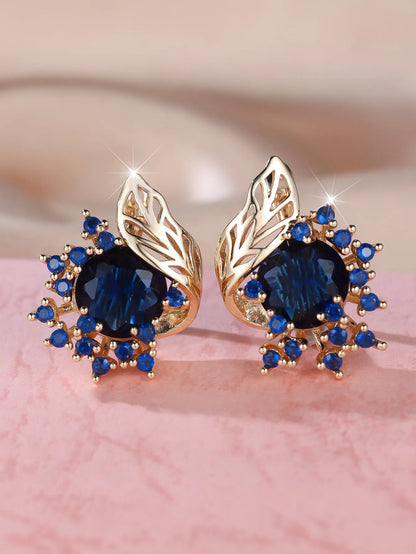 Round flower and feather design earrings in champagne gold with a choice of coloured zircon stones.