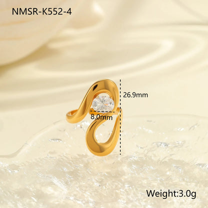 Geometric zircon ring showing round, oval and quadrangular design elements in stainless steel with electroplated finish
