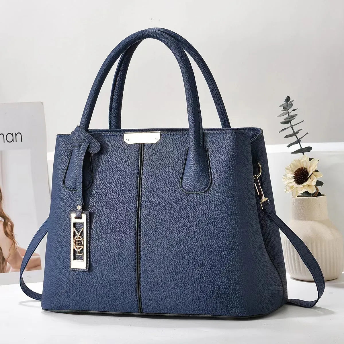 Soft PU leather large capacity shoulder bag in a horizontal square shape with an adjustable strap